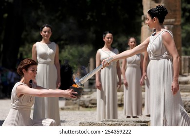 OLYMPIA , GREECE, MAY 9, 2012: High Priestess, the Olympic flame during the Torch lighting ceremony of the Olympic Games in London in 2012 at ancient Olympia