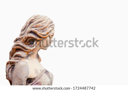 Olympic goddess of love and beauty in antique mythology Aphrodite (Venus) against white background. Fragment of ancient statue. 