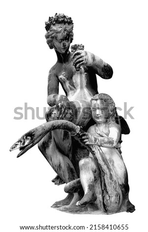 Olympic goddess of love and beauty Aphrodite (Venus) with little Cupid (Amur) and swan. An ancient statue. Black and white image.