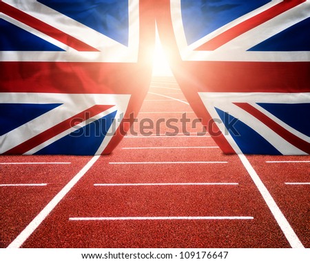 Olympics London concept with sun shining trough British flag curtains on running track