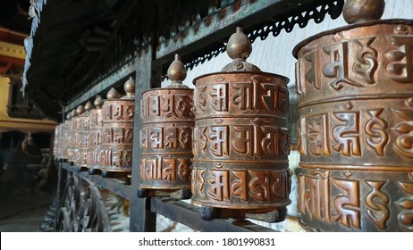 "Om mani padme hum" Tibetan Buddhist prayer wheels, temple in Nepal, holy sacred shrine,Swayambhunath stupa, monkey temple, UNESCO World Heritage