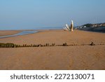 Omaha beach at low tide near Vierville-sur-Mer, Normandy, France. Commemorating the D-Day landings of 6th June 1944