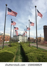 Omaha, NE, USA April 30, 2018 Two rows of American flags line the entrance to ConAgra Foods in Omaha, Nebraska