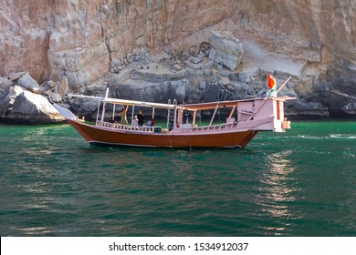 Oman, Dhow Boat With Tourists In Sea Fjords, Khasab