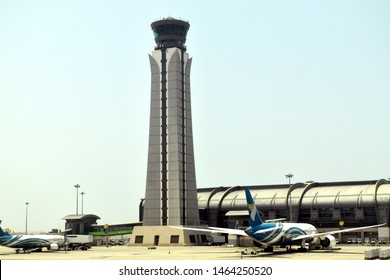 Oman, Muscat, Dated 19 July 2019. Picture Of The New Airport Of Muscat, Oman Air Plane With The Modern Control Tower.