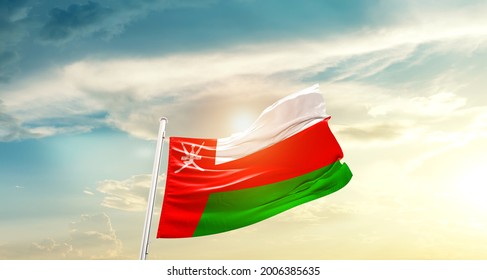 Oman National Flag Waving In Beautiful Clouds.