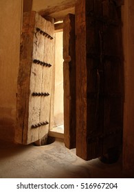 oman / old wooden door / picture showing huge wooden door in one of Oman's most stunning forts. Taken in Oman in June 2014 - Shutterstock ID 516967204