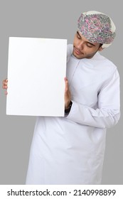 Omani Business Man Holding White Board