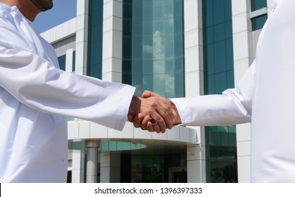 Omani Businessman Giving An Handshake To His Business Partner, Muscat