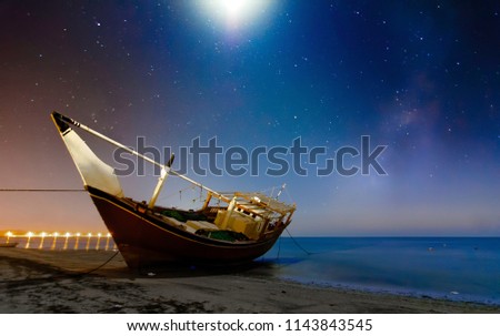 Omani dhow under the moon