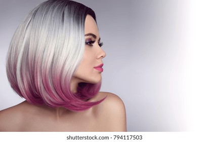 Ombre bob short hairstyle. Beautiful hair coloring woman. Trendy haircuts. Blond model with short shiny hairstyle. Concept Coloring Hair. Beauty Salon. 
