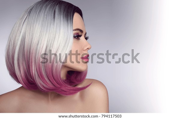 Ombre bob short hairstyle. Beautiful\
hair coloring woman. Trendy haircuts. Blond model with short shiny\
hairstyle. Concept Coloring Hair. Beauty Salon.\
