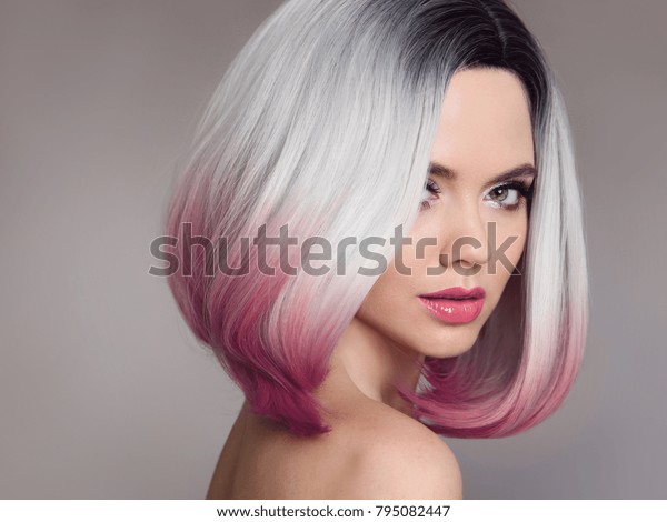 Ombre bob short hairstyle. Beautiful\
hair coloring woman. Fashion Trendy haircut. Blond model with short\
shiny hairstyle. Concept Coloring Hair. Beauty Salon.\
