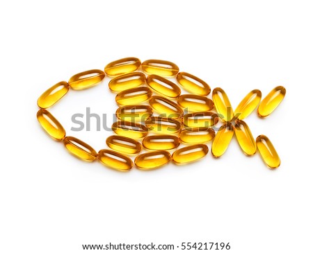 Omega 3 capsules - fish shape, isolated on white background. Top view, copy space, high resolution product. Health care concept