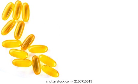 Omega 3. Oily Fish, In Capsules, On A White Background. Healthy Food. Vitamin D, E, Fish Oil Capsules.