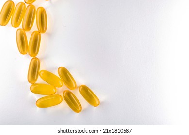 Omega 3. Oily Fish, In Capsules, On A White Background. Healthy Food. Vitamin D, E, Fish Oil Capsules.