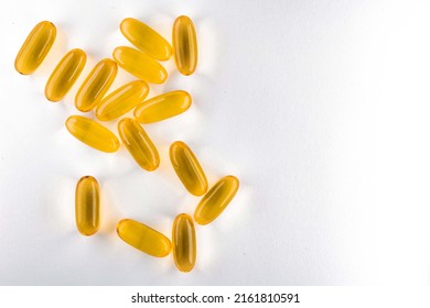 Omega 3. Oily Fish, In Capsules, On A White Background. Healthy Food. Vitamin D, E, Fish Oil Capsules.