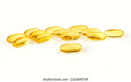 Omega 3. Oily Fish, In Capsules, On A White Background. Omega3. Healthy Food. Vitamin D, E, Fish Oil Capsules.