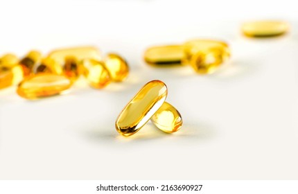 Omega 3. Oily Fish, In Capsules, On A White Background. Omega3. Healthy Food. Vitamin D, E, Fish Oil Capsules.