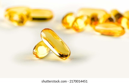 Omega 3. Oily Fish, In Capsules, On A White Background. Omega3. Healthy Food. Vitamin D, E, Fish Oil Capsules.