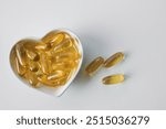 Omega 3 vitamins on a bright background, copy space.