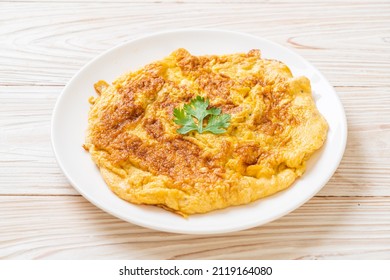 Omelet or Omelette with Ketchup