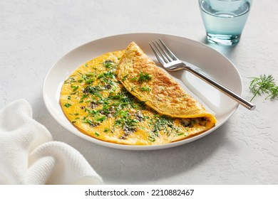 omelette with blue cheese herbs spring onion. healthy keto diet low carb breakfast