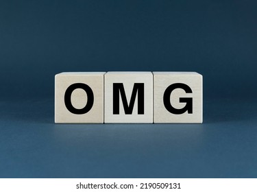 Omg. Cubes Form The Word OMG. Concept Of The Word OMG - Oh My God, Expression In Communication Of Reaction And Emotions - Shock, Wow, Surprise, Laughter