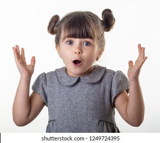 OMG! Wow! Happy Surprised Child 4 Or 5 Years Old Isolated On White. Shocked Face Little Kid On White Background. Young Girl Open Mouth, Big Eyes And Crazy Expression