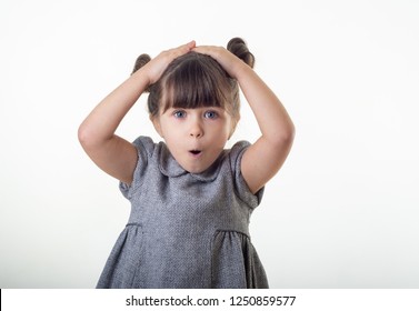 OMG! Wow! Happy Surprised Child 4 Or 5 Years Old Isolated On White. Shocked Face Little Kid On White Background. Young Girl Open Mouth, Big Eyes And Crazy Expression