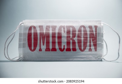 Omicron Coronavirus Background Image For The News.omnicron Text Printed On Surgical Mask Image.New Covid Variant