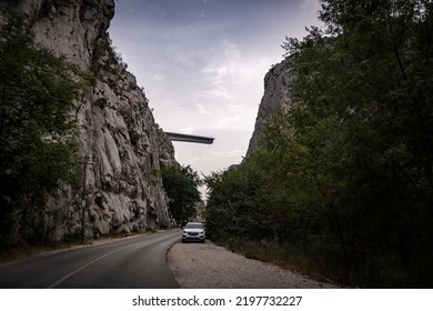 Omis, Croatia-August 18th, 2022: New Bridge Construction Passing Through Two Opposite Rocky Cliffs At The Town Of Omis, Croatia