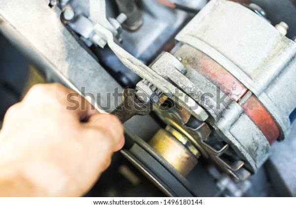 On a bad big old starter, tighten the iron bolt\
with a wrench. Car repair.