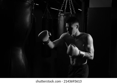 On and black beats Boxer a a grunt black background white photo strength shadow fight box, from sexy boxer in one and power competition, model fit. Bag training active, guy grayscale