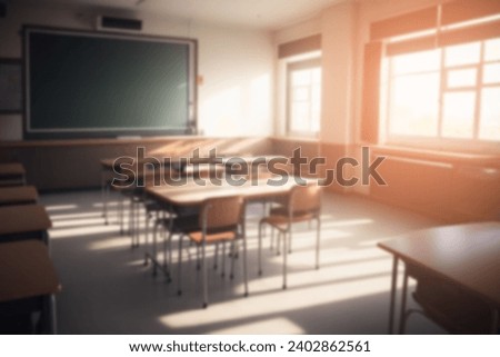 On the blurred background of the empty classroom