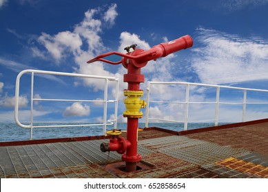 On Board Fire Fighting Foam, Water Gun Aboard Of Tanker Ship On Blue Sky Background