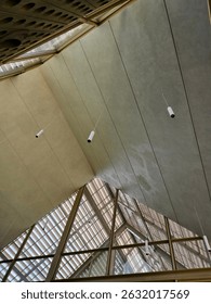 On the ceiling and windows of a building with modern and striking architecture.