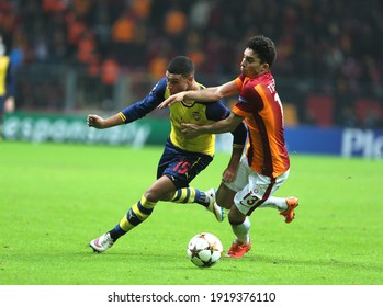 On December 9, 2014, In Istanbul Türk Telekom Arena Stadium, Galatasaray Football Team Lost To Arsenal Team 4-1 In The Champions League. (L) Alex Oxlade Chamberlain, Alex Telles