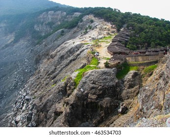on the edge of the crater