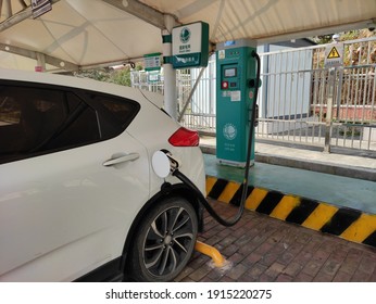 On February 12, 2021, China State Grid's New Energy Vehicle Charging Station In The High-speed Service Area. The Electric Car Is Charging.