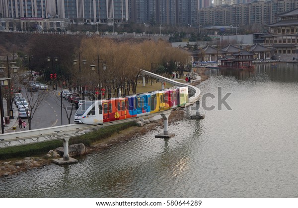 On February 8, 2017, a sightseeing car from xi \'an\
QuJiangChi light rail across the park. Visitors can be 10 meters\
high, see the beautiful landscape around the sightseeing light rail\
(9.5 km).