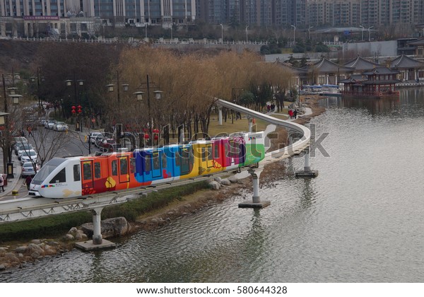 On February 8, 2017, a sightseeing car from xi \'an\
QuJiangChi light rail across the park. Visitors can be 10 meters\
high, see the beautiful landscape around the sightseeing light rail\
(9.5 km).