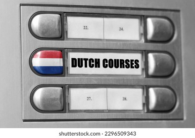 On the intercom there is a button with the flag of the Netherlands and the inscription - Dutch Language Courses.