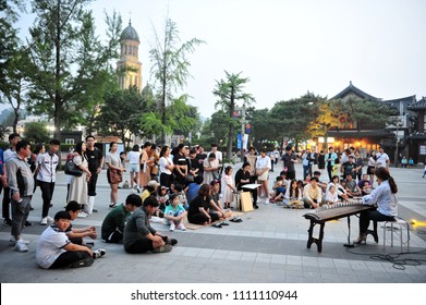 On June 8, 2018, Young korean musicians are doing traditional Korean busking in front of the Gyeonggijeon in Jeonju Hanok Village, South Korea.