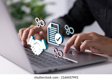 On A Laptop Computer, An Online Agreement Contract Paper. Concept For An Online Business Arrangement.