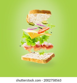 On A Light Green Background, A Sandwich In A State Of Levitation. Delicate Pastel Colors. There Are No People In The Photo. There Is An Empty Space For Your Insert. Abstraction.