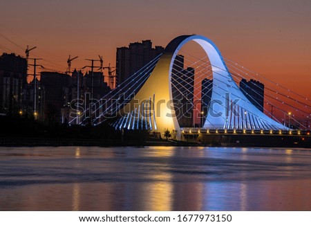 On March 19, 2020, the light of Huaihai South Road Bridge on the Beijing Hangzhou Grand Canal in Huai'an City, Jiangsu Province, China flashes.