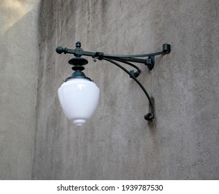 On Outdoor Light Fixture On The Wall.