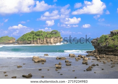 On a quiet shore in Central Java,
the beach welcomes the day with gentle waves.
The wind blows softly,
carrying the warmth of the sun and the scent of the sea.