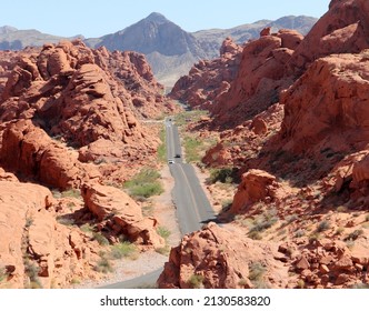 On the Road Again. Wonderful landscapes driving and walking along the roads of Valley of Fire, Nevada, USA. May 2021. Traveling and enjoying vacation and holidays after pandemic time.
